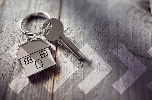 Leased Land Loan - Keys lying on a worn wood table