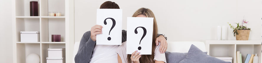 home buying frequently asked questions - couple holding question
