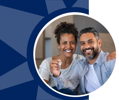 A middle-aged couple holds the keys to their new house.