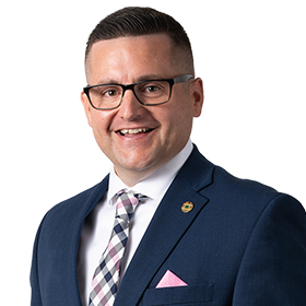 Headshot of Ty Swisher