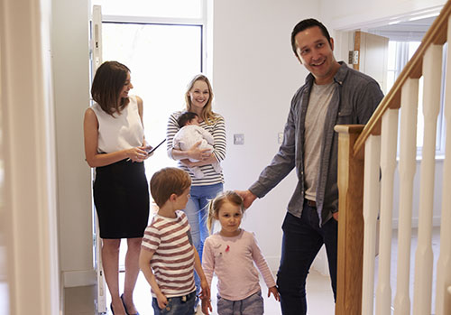 Family looking at new home