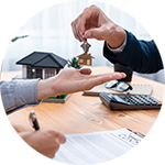 Handing over house keys to new home buyer - home loans