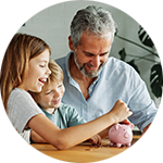 Family saving money in piggy bank - home equity loans