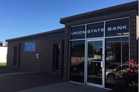 Single story commercial building with exterior sign
