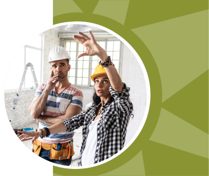 Workers discuss plans for a room renovation.