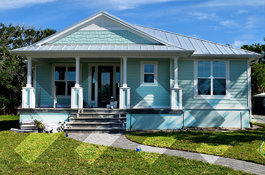 FHA Loan - Starter home with a welcoming porch.